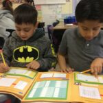 Eres Aspire second-graders pair up to work on math.